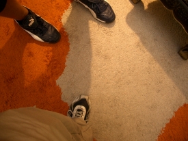 Fuesse Schuhe Teppich