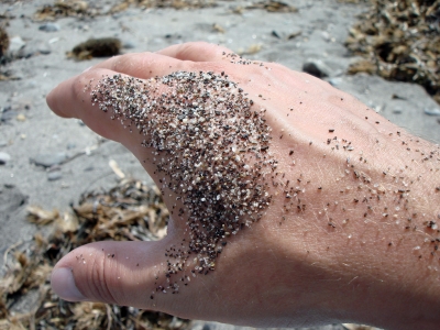 Sand auf Hand
