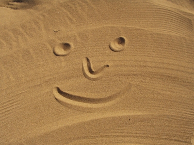 Smiley im Sand