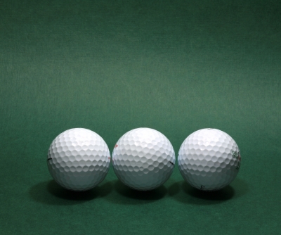 Drei Golfbälle