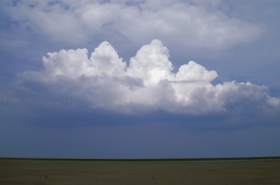 Wolke über einem Strand bei St. Peter Ording