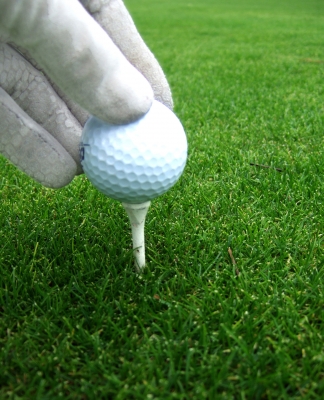 Golfspieler beim aufteen