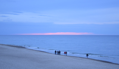 Strandläufer bei Sonnenuntergang
