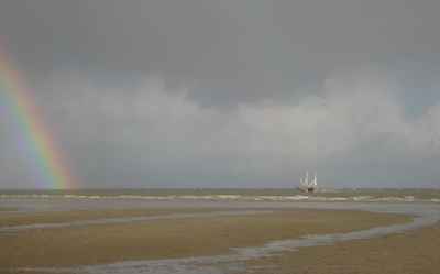 Regenbogen am Strand