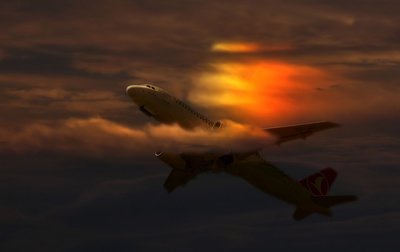 Flug in den Sonnenuntergang