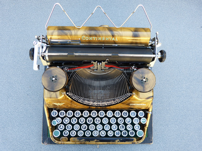 Goldene Continental Klein-Conti Schreibmaschine