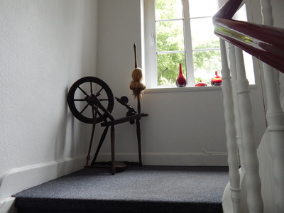 Spinnrad im Treppenhaus