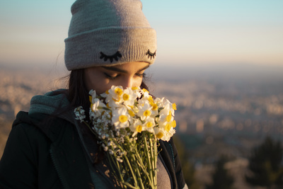 Girl smelling flower Girl smelling flower